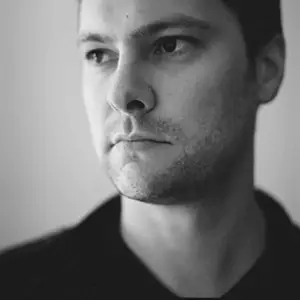 Black and white portrait photo of Jethro Woodward