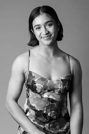 Black and white portrait photo of Asha Colless.